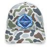 Brackish and white slate trucker hat with a detailed acrylic blue marlin patch on the front. Features a breathable mesh back and an adjustable snapback closure. The curved bill provides shade, making it perfect for fishing, boating, and coastal adventure