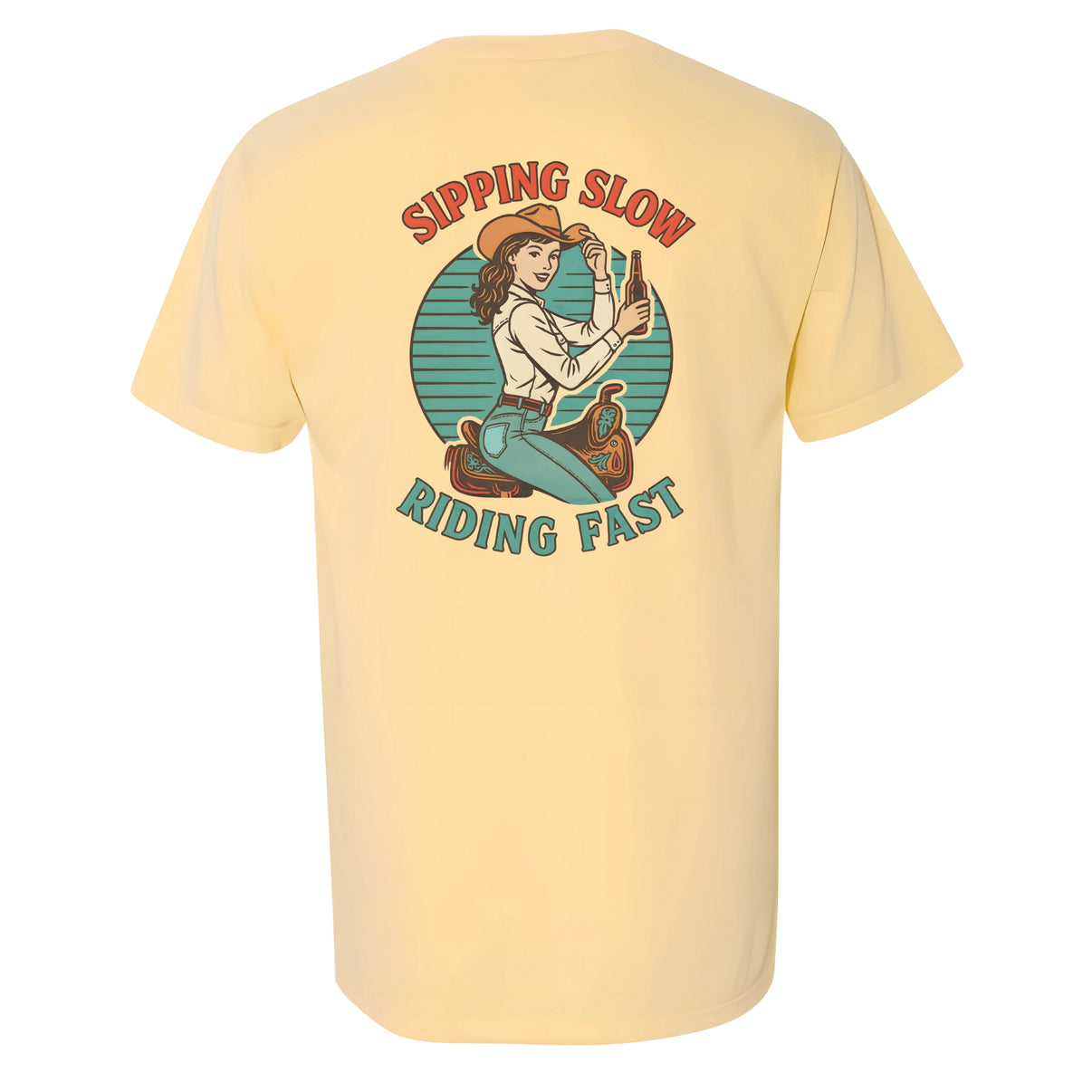 Retro western graphic t-shirt with cowgirl illustration and bold text that reads 'Sipping Slow, Riding Fast' printed on the  Butter Comfort Colors pocket tee.
