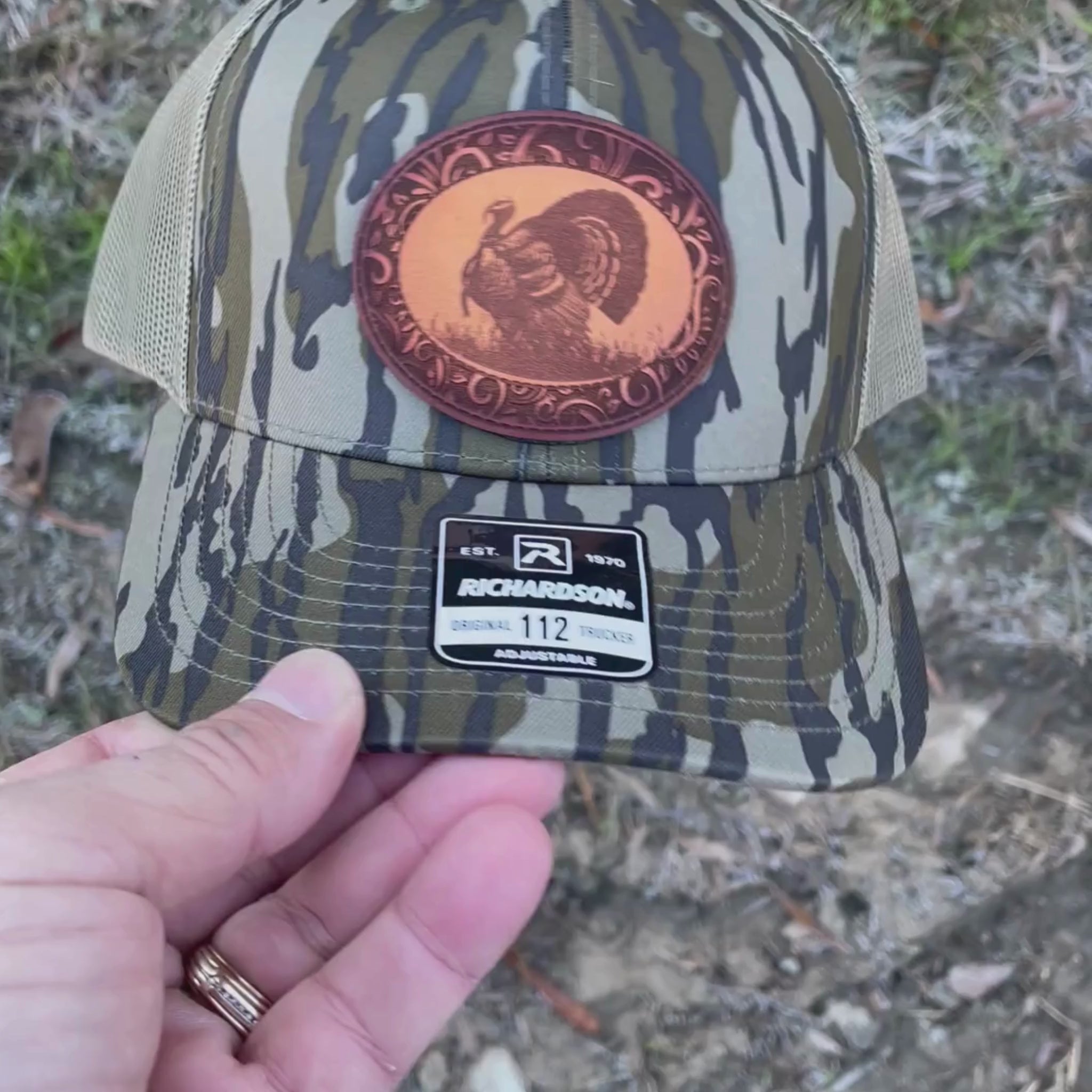 Video of a Richardson Mossy Oak Bottomland hat with leather turkey patch.