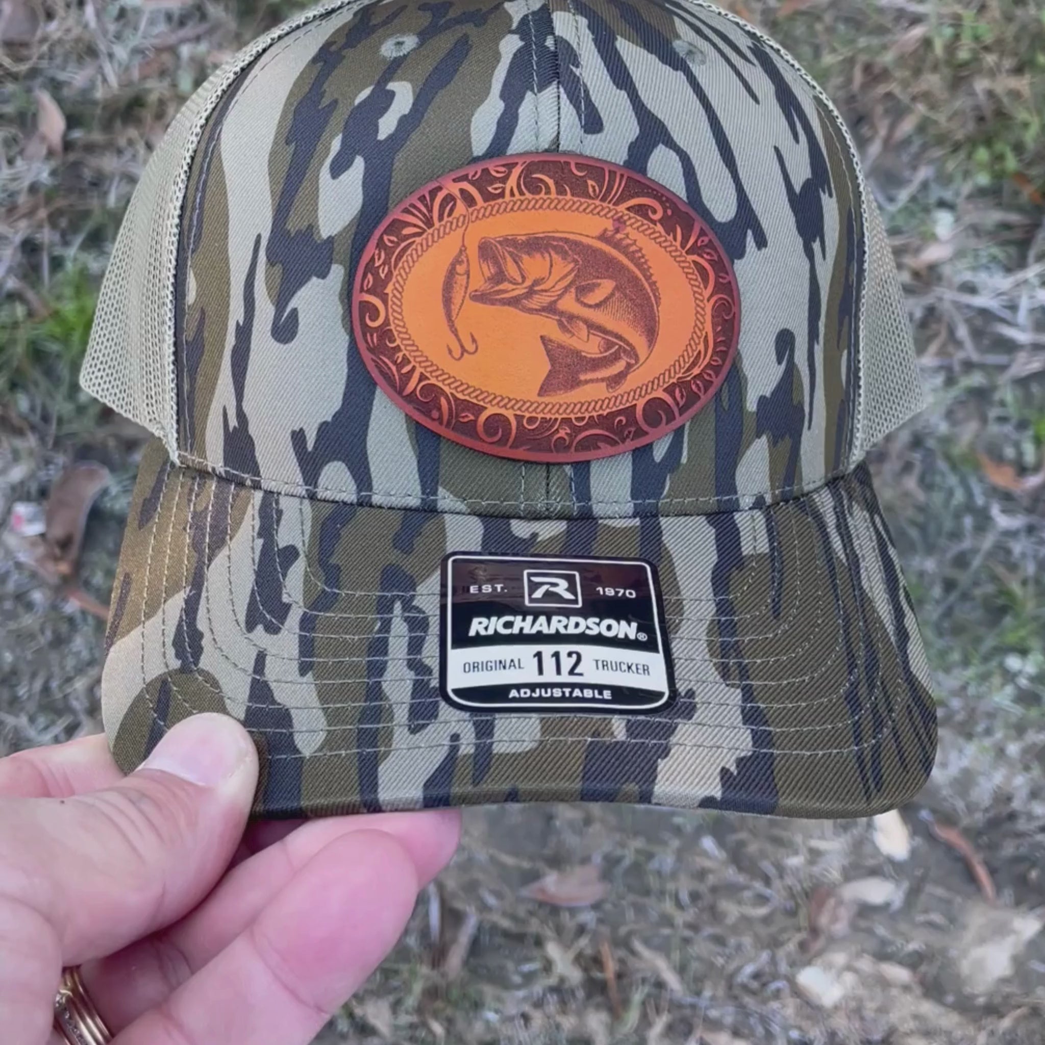 Video of a Richardson Mossy Oak Bottomland camo hat with a leather fish patch